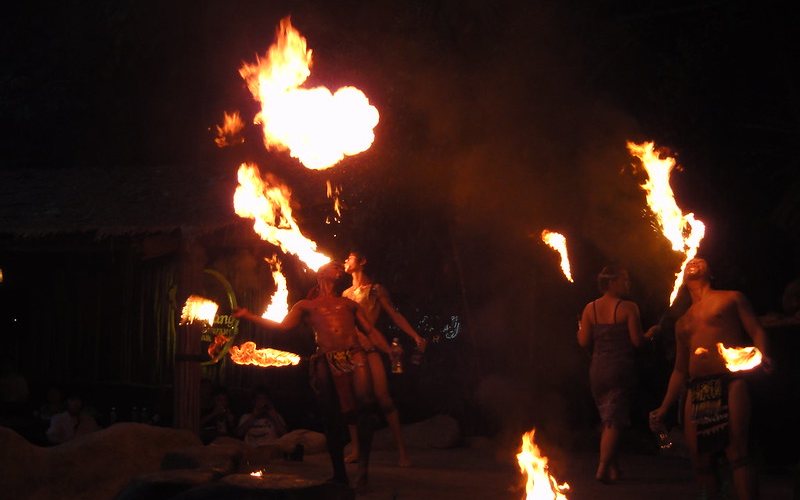 men performing fire show