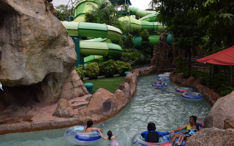 family enjoying in waterpark